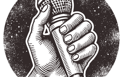 Eine Hand hält ein Mikro